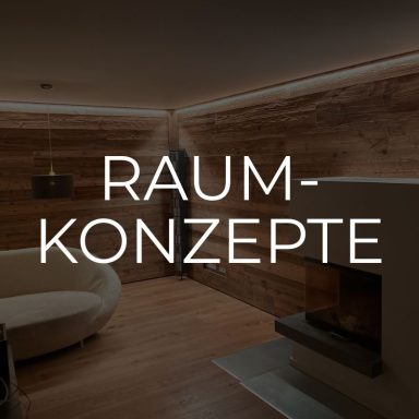 Wohnzimmer mit moderner Wandverkleidung aus Holz – Raumkonzepte der Schreinerei Kögel.